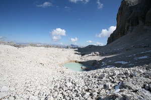 The Lech dl Dragon on the rockglacier Murfreit on the northern side of the Sella massif.